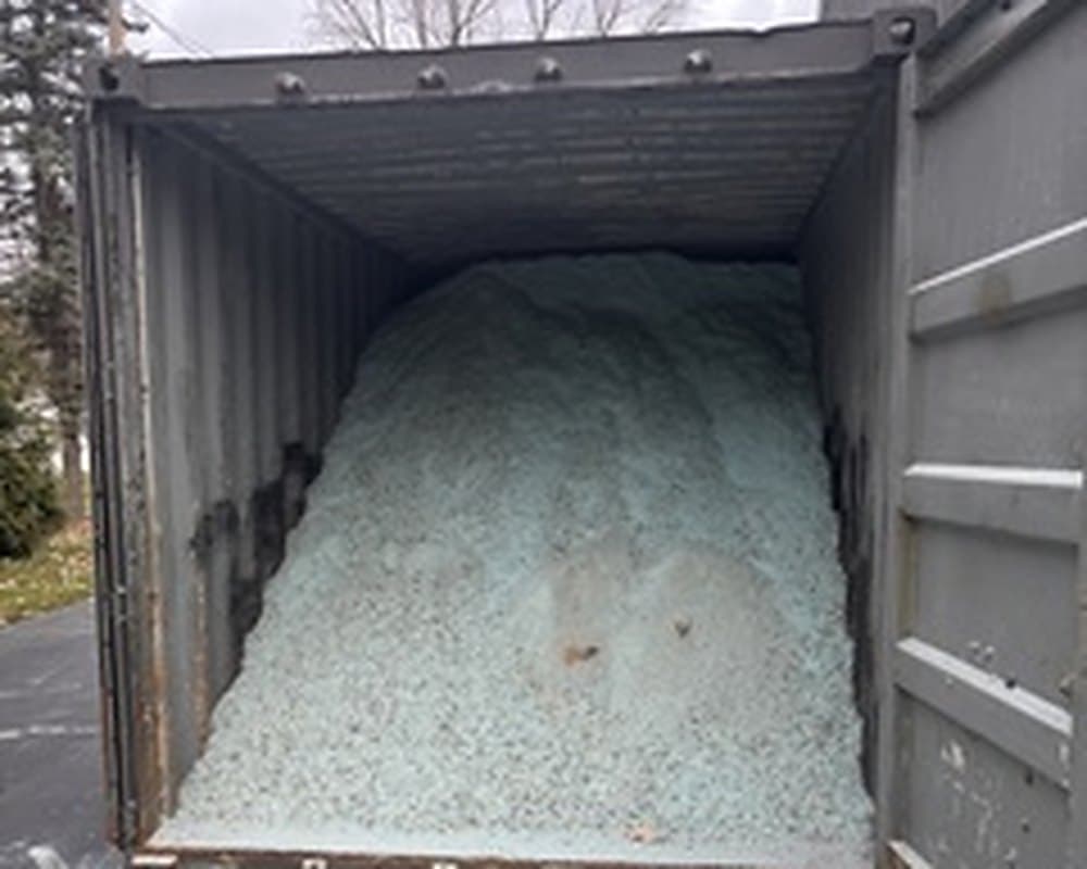 Storage container stocked with bulk salt and ice-melt ahead of a storm